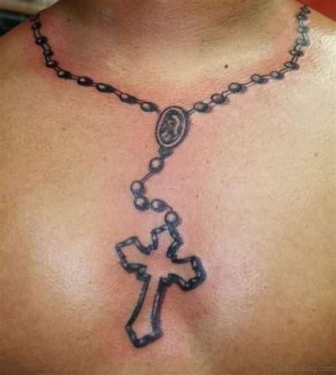 rosary tattoo on chest|rosary tattoo for female.